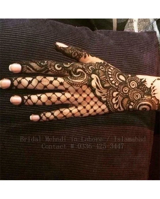 Filigree Vine Extension Blending Into Back Hand Mehndi Design Filigree Vine Extension Blending Into Back Hand Mehndi Design